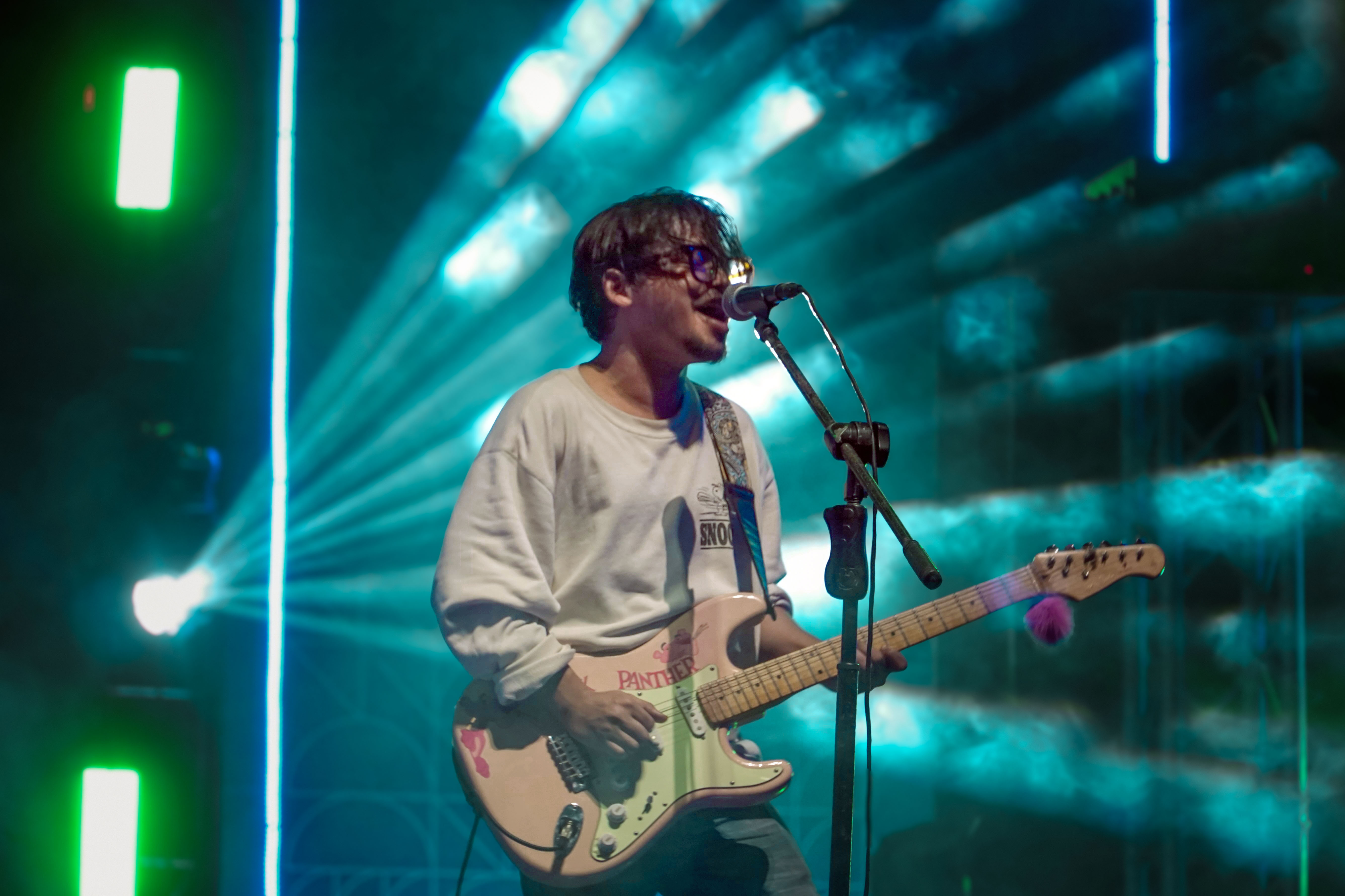 Samee performing with his Pink Panther Stratocaster